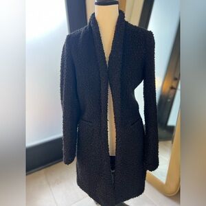 Open boucle black jacket.